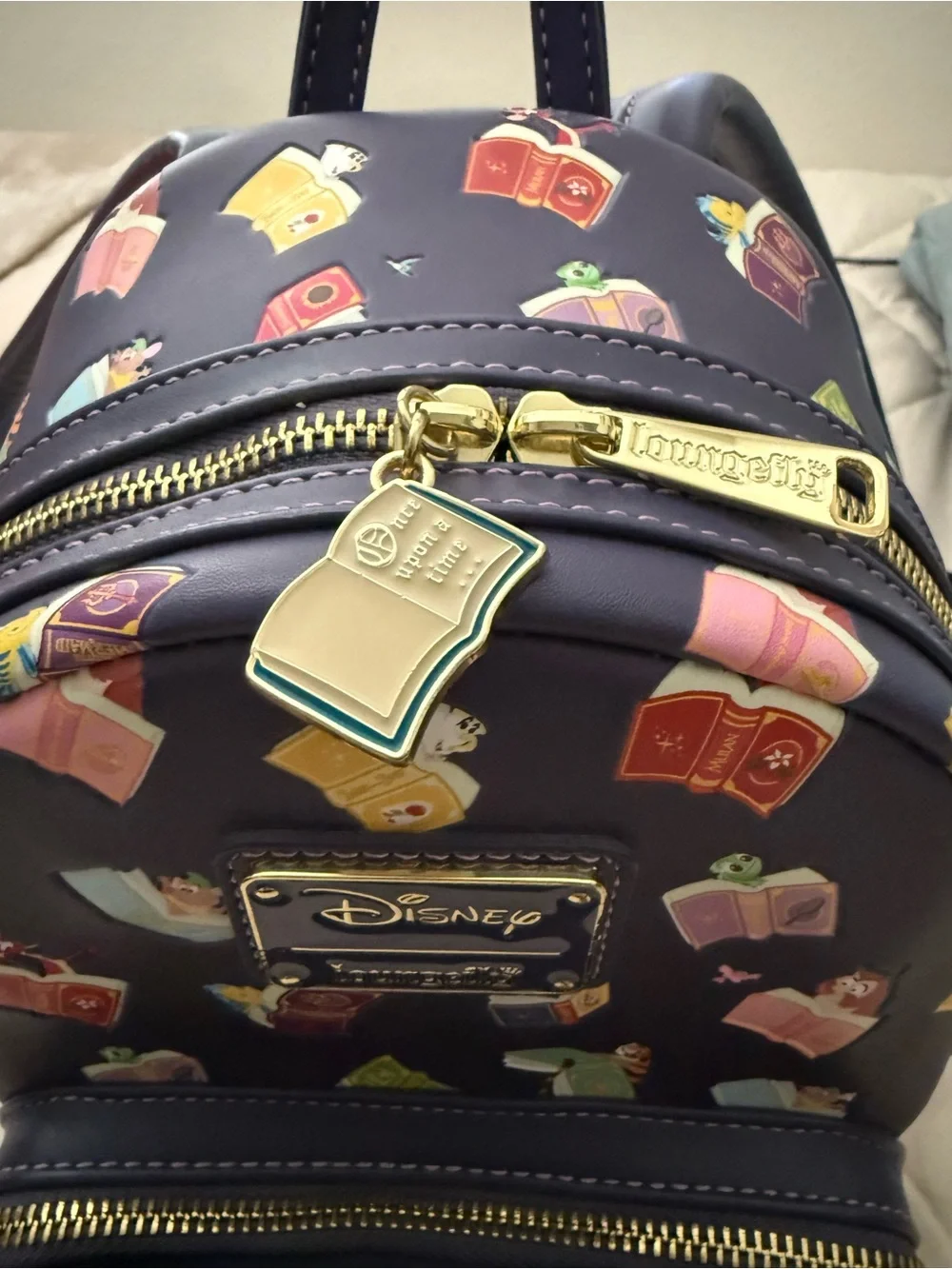 Loungefly Disney Princess Storybook Stack Mini Backpack - Navy, Red, Green, Gold